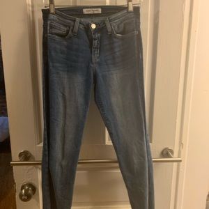 Flying Monkey jeans with dark stripe on side.